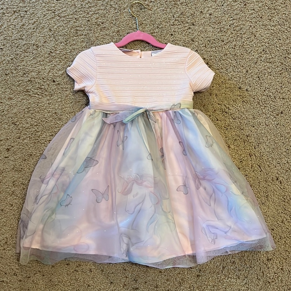 Beautiful girls twirl dress for wedding or event with unicorn tulle